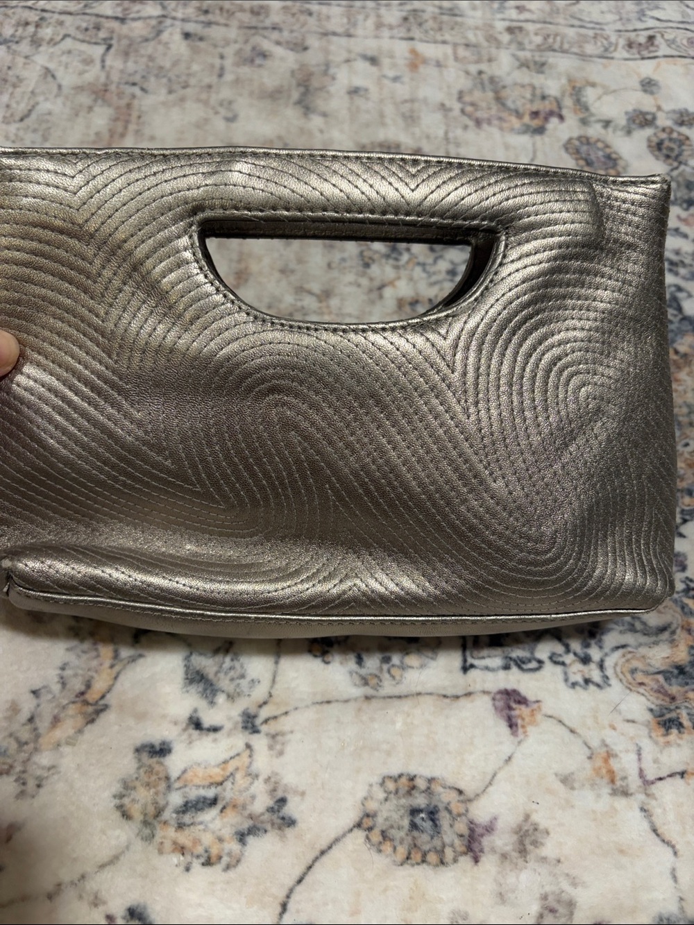 The Limited Metallic Silver Textured Clutch